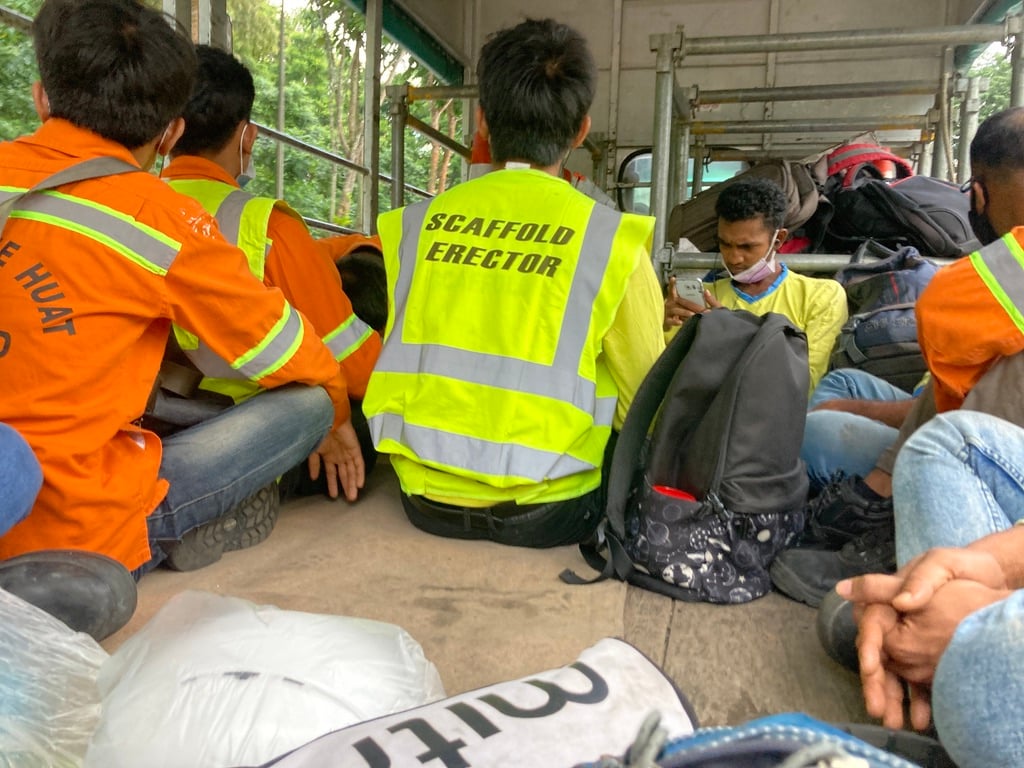 In July 2022, I became a construction worker for a day, to better understand what it was like for them, carrying poles, standing under the hot sun, and sleeping with others. 